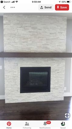 an empty living room with a fireplace in the center and wood flooring on the other side