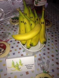 some bananas are sitting in a bowl on a table