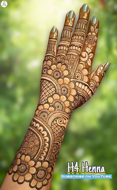 henna on the hand with green background