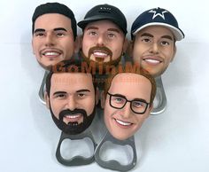 five men with beards and glasses are posed in the shape of a pair of scissors