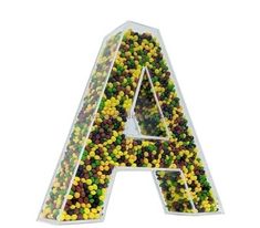 a letter made out of candies on top of a white background with the letter'a'in it