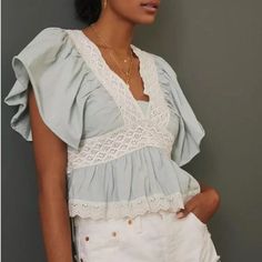 Nwt!! Never Been Worn! Description: V Neck Short Ruffle Sleeves Crochet Lace On Top Eyelet Embroidery On Top Measurements/Item Details Size - Small Bust - 18" Across (Laying Flat) Length - 19.5" Approx Color - Sky Fabric - Cotton Please Note: This Item Is New With Tags. Summer Lace Tops With Puff Sleeves, Summer Lace Top With Puff Sleeves, Summer Puff Sleeve Lace Top, Summer Lace Blouse With Puff Sleeves, Cute Brunch Tops With Ruffle Hem, Chic Lace Top With Puff Sleeves And Lace Trim, Fitted Ruffle Crochet Top, Spring Puff Sleeve Top With Lace Patchwork, Chic Lace Patchwork Tops For Spring