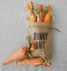 some carrots that are in a burly bag with the words bunny bat on it