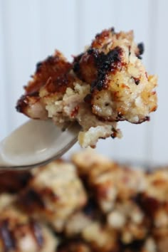 a close up of food on a spoon