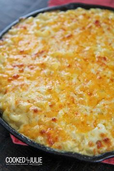 a cheesy casserole in a cast iron skillet