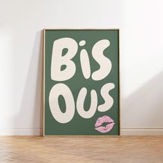 a green poster with the words biss ous written in pink lipstick on it