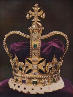 a gold crown with jewels on it