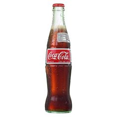 a bottle of coca cola on a white background