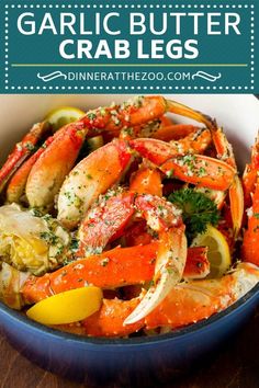 garlic butter crab legs in a bowl with lemon wedges