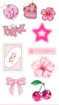 a bunch of stickers that are on top of a white surface with pink flowers