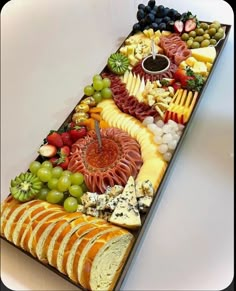 a long platter filled with lots of different types of food