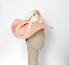 Elegant Blush kentucky derby hat, bow kentucky derby fascinator ascot hat, Light pink hat, light salmon ascot fascinator, womens races hats, bow fascinate hat. This and Soft Pink fascinate hat is embellished with a cream big bow. It is a perfect hat for weddings, Royal Ascot horse races, cocktails, derby... It is mounted on a headband. If you want, you can choose the side of the head were you like to wear the fascinator, just convo me. Any color of the fascinator can be changed to order. * PROCE Pinched Crown Top Hat For Races In Spring, Adjustable Bow Hat For Royal Ascot, Pinched Crown Top Hat For Spring Races, Elegant Boater Hat With Bow For Kentucky Derby, Structured Crown Top Hat For Summer Evenings, Chic Pink Boater Hat For Kentucky Derby, Summer Evening Top Hat With Structured Crown, Chic Pink Mini Hat For Royal Ascot, Chic Kentucky Derby Fascinator With Pinched Crown