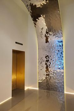 an artisticly designed hallway in a modern building