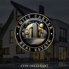 the logo for emery real estate, which is located in front of a large house