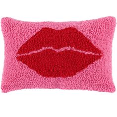 a pink pillow with a red lipstick print on the front and bottom, it is made out of fuzzy material