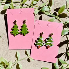 The cutest Christmas Tree earrings! These handmade polymerclay earrings are hypoallergenic made with nickel free findings. Dimensions: 1.5" H x 0.9" W Check out my full Christmas Collection for more fun festive earrings and follow along for more unique jewelry finds :) I don't accept any returns or exchanges, but please message me if you have any issues with your order.  All order $35+ ship for free! Festive Earrings, Cute Christmas Tree, Tree Earrings, Christmas Tree Earrings, Earring Tree, Christmas Collection, Wedding Basket, The Cutest, More Fun