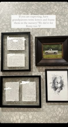 some framed pictures and papers on a wall