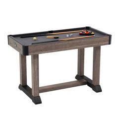 the pool table is made from wood and has two billards on one end, with cues