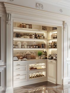 a kitchen with white cabinets and shelves filled with food on top of marble flooring