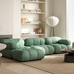 a living room filled with lots of furniture and decor on top of carpeted flooring