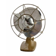 an old fashioned metal fan on a white background