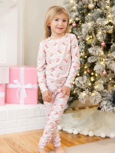 Celebrate the magic of the holiday season with our Family Pajamas. Perfect for creating sweet, lasting memories with your family, these matching pajamas bring a sense of togetherness and festive cheer. Made from our signature ButterSoft fabric, you'll stay cozy and comfortable, whether you're decorating the tree, baking cookies, or enjoying a holiday movie night together. Sizing Model is wearing YS. YS = 6/7 | Chest 22.75", Waist 20.75", Hips 22", Inseam 28" YM = 8 | Chest 24.5", Waist 22.5", Hi Holiday Movie Night, Erin Gray, Baby Pjs, Childrens Pyjamas, Adorable Style, Comfy Sets, Baking Cookies, Holiday Movie, Matching Pajamas