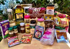 a table topped with lots of food and condiments