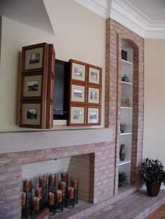 a living room filled with furniture and a flat screen tv mounted on the wall above a fire place