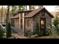 a small house with stone steps leading to it