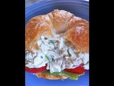 a close up of a sandwich with chicken salad on it