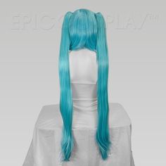 Eos Anime Blue Mix Long Pigtail Wig Set Long and glamorous twintails are exactly what cosplay dreams are made of. Those dreams are about to become a reality, as you can now wear this adorably classic hairstyle with ease thanks to our Anime Blue Mix long pigtail wig set. Our beautiful bob cut Chronos style serves as the base for this long pigtail wig set. This style is specifically fashioned to frame and flatter the face, making it the perfect base for such an adorable hairstyle. Versatile front Pigtail Wig, Front Bangs, Two Ponytails, Miku Cosplay, Green Wig, Straight Ponytail, Cosplay Hair, Epic Cosplay, Classic Hairstyles