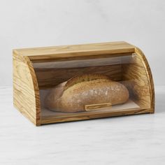 a loaf of bread in a wooden box