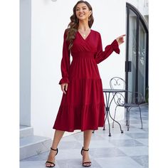 Elevate your wardrobe with the WhizMax Women's Casual Wrap V-Neck Midi Dress, a perfect blend of elegance and comfort. This dress features a captivating wine red color and is designed to flatter with its smocked waist and tiered A-line pleated skirt.

- Style: Casual wrap V-neck
- Sleeve: Long lantern sleeves
- Waist: Smocked elastic high waist
- Skirt: Tiered, swing, A-line pleated flowy hem
- Closure: Pull-on
- Material: Lightweight fabric for comfort
- Gender: Female
- Age Group: Adult

Ideal Red V-neck Midi Dress, Elegant Red V-neck Dress For Fall, Chic Burgundy V-neck Maxi Dress, Flowy Ruffle Dress, Flowy Long Dress, Midi Dress Long Sleeve, Wine Red Dress, A Line Long Dress, Flowy Dress Long