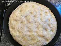 an omelet is cooking in a skillet on top of the stovetop