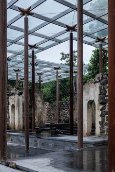 the inside of an abandoned building with columns