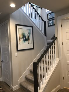 the stairs in this house are painted white