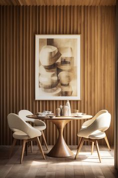 a dining room table with chairs and a painting on the wall above it, in front of a wooden paneled wall