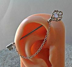 an ear with a chain attached to it