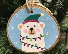 a christmas ornament with a polar bear on it