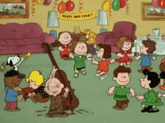 a group of children dancing in a living room with balloons and decorations on the walls