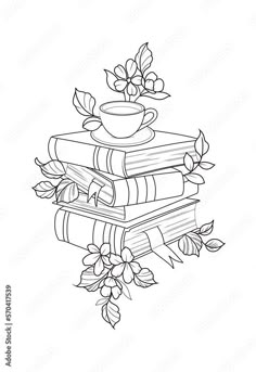 a stack of books with flowers on top and a cup sitting on top of them