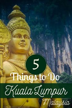 a statue with the words 5 things to do in kulla lumpi malaysia