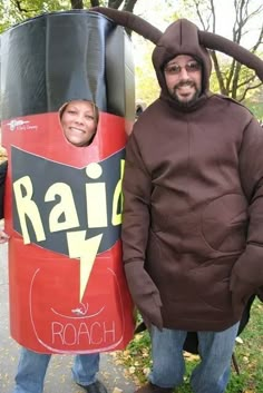 two people dressed in costumes standing next to each other