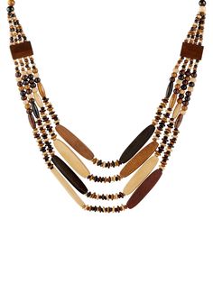 PRICES MAY VARY. Vintage Aesthetic: Elevate your style with this multi-layered long necklace featuring wooden beads for a retro-chic vibe. Layered Design: Crafted with multiple strands, this necklace creates a striking layered look that complements any outfit. Bonus Earrings: Enhance your ensemble with the included pair of coordinating earrings, perfect for a complete and cohesive look. Versatile Accessory: Suitable for casual or dressy occasions, this necklace and earring set is a versatile add Multicolor Long Necklace With Wooden Beads, Elegant Multicolor Wooden Beads Necklaces, Bohemian Brown Multi-strand Beaded Necklaces, Bohemian Brown Multi-strand Beaded Necklace, Brown Multi-strand Wooden Beaded Necklaces, Monochrome Fashion, Retro Chic, Vintage Aesthetic, Accessories Earrings