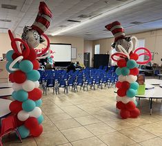 two dr seuss and cat in the hat balloon columns