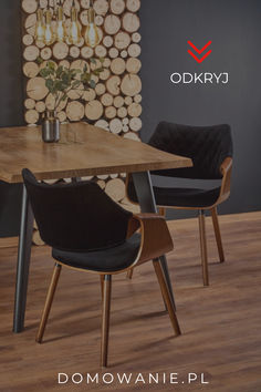 the dining table is made from wood and has black upholstered chairs around it