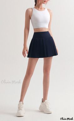 Olivia Mark - Sporty Tennis Skirt with Secure Side Pockets and Pleated Design Navy Stretch Tennis Skirt For Summer, Casual Fitted Navy Tennis Skirt, Navy Stretch Casual Skort, Navy Casual Fitted Tennis Skirt, Navy Casual Skort Short Length, Casual Navy Skort With Pockets, Navy Casual Short Length Skort, Casual Navy Skort With Lined Skirt, Casual Navy Lined Skort