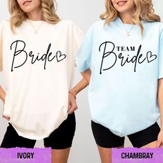 two women wearing matching shirts with the words bride and team bride written on them in black