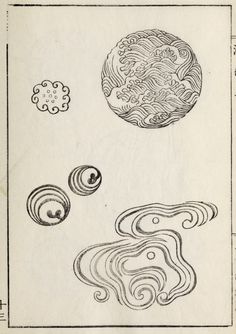 an old book with drawings on it and two circles in the middle, one circle has swirls