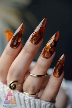 Step up your nail game with these sophisticated brown acrylic nails featuring subtle golden accents. The perfect blend of class and style. Find more nail inspirations at nailhow.com! 💅✨ #AcrylicNails Fall Nails 2024 Brown, Gold And Brown Nails, Brown Nail Design, Mani Designs, Taupe Nails, Brown Nail Art, Silk Wrap Nails, Brown Acrylic Nails, Wine Nails